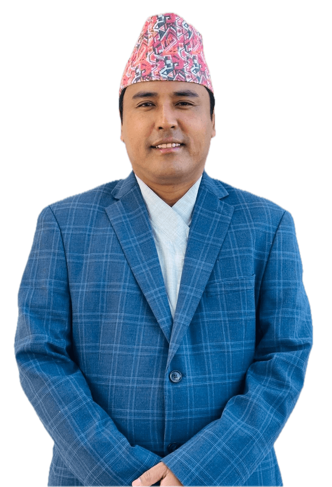 Portrait of Suraj Pakhrin smiling in a suit and Nepali topi (traditional hat)